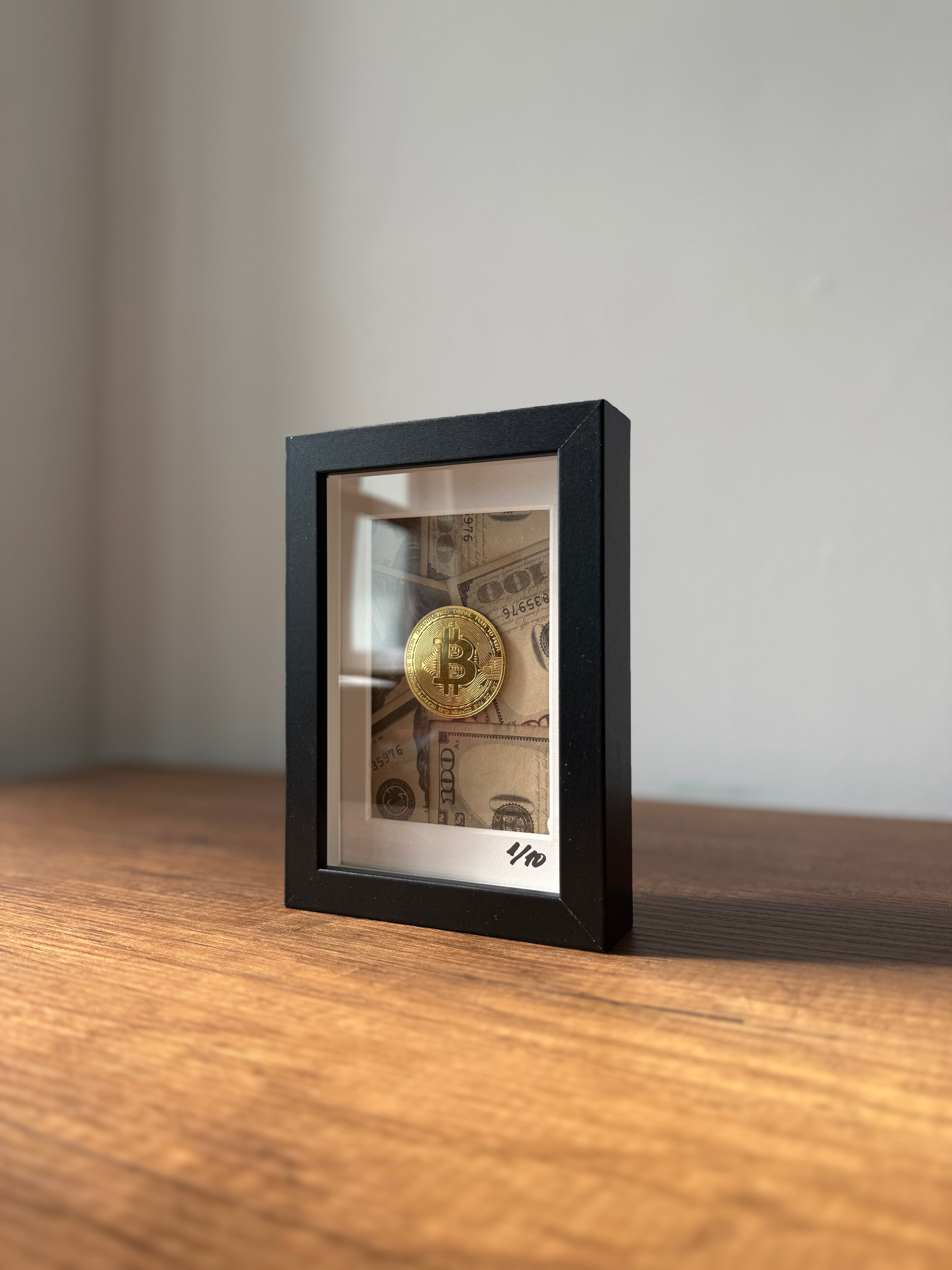 Digital Gold Frame by object100™ displayed in premium black wooden frame