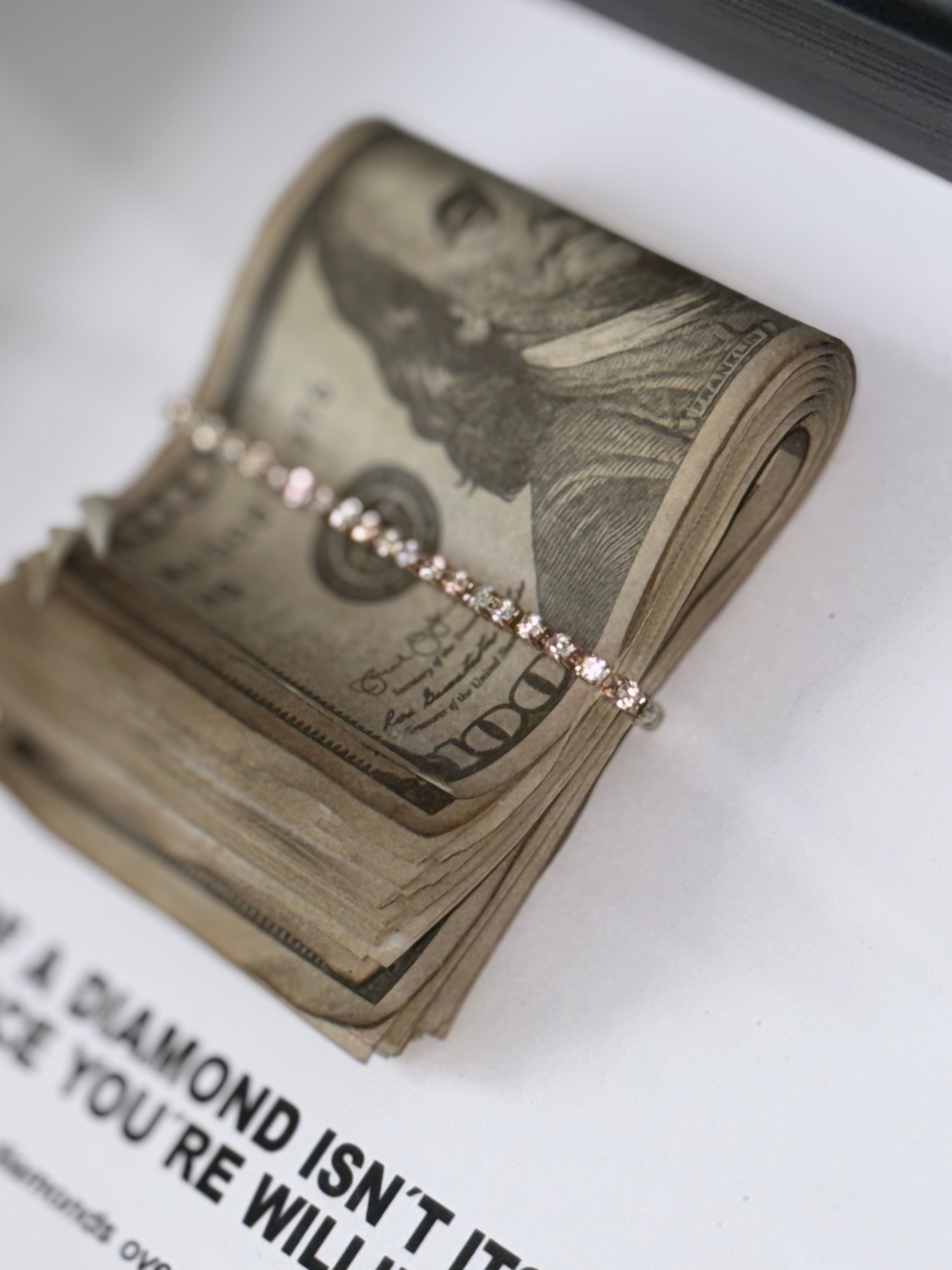 Close-up of bundled banknotes in object100™ In Case of Inflation – Diamonds Frame