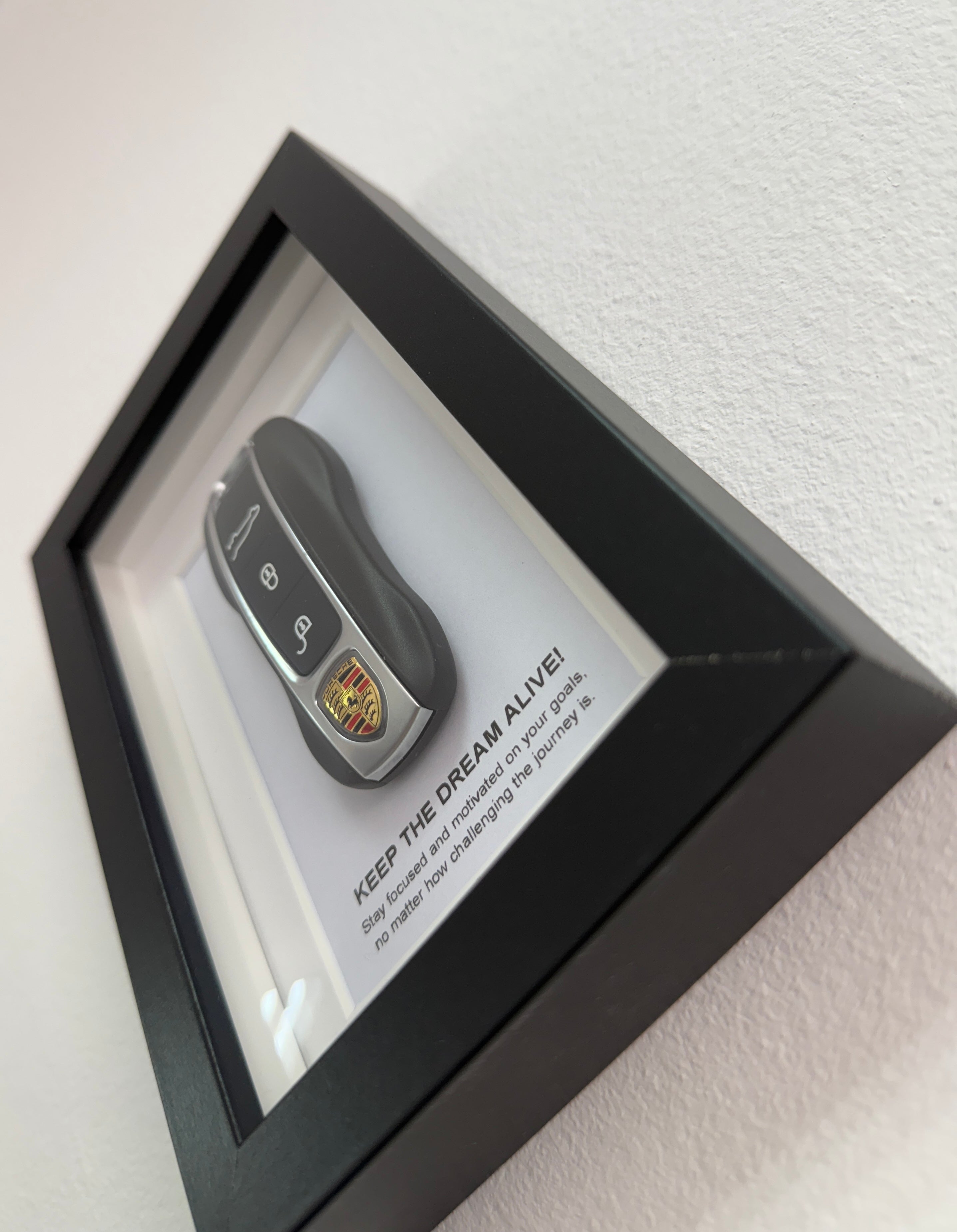 Angled view of object100™ Keep The Dream Alive framed collectible artwork